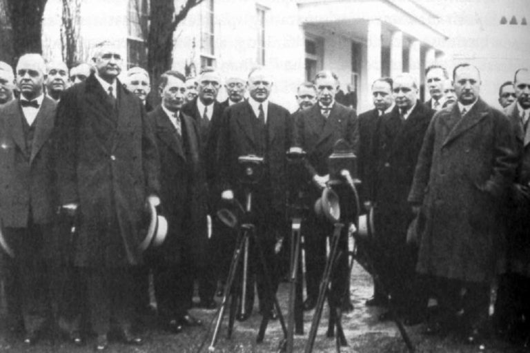Jesse Jones (front row, second from left) and President Herbert Hoover (center), 1932. Courtesy Library of Congress.